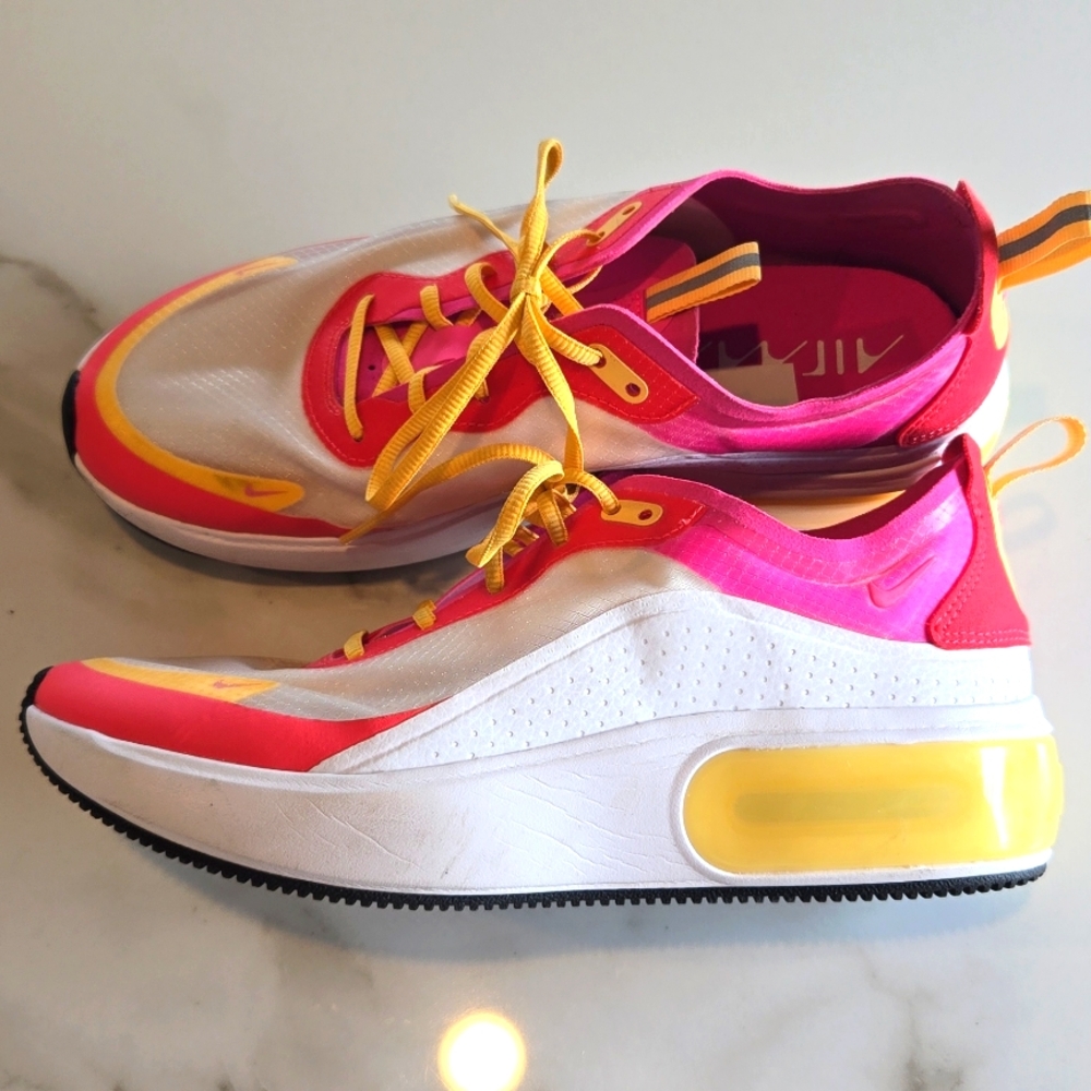 Nike Pink and Yellow Athletic Shoes with Sleek Design - Picture 3 of 6